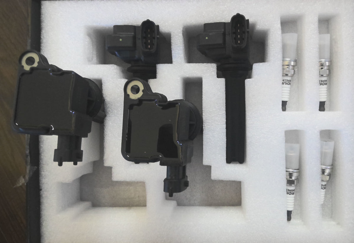 4 Ignition Coils w/4 Iridium Spark Plug Coils pack